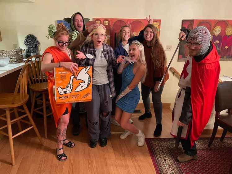 wvu collegiate recovery community poses for funny photo at halloween party