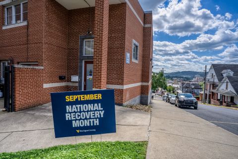 sign that says September National Recovery Month in front of Serenity Place