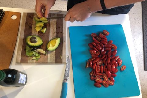 students preparing avocados and dates