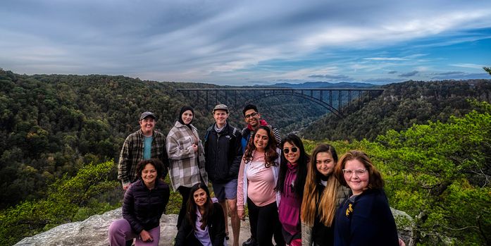 students posing for a picture at the new river gorge